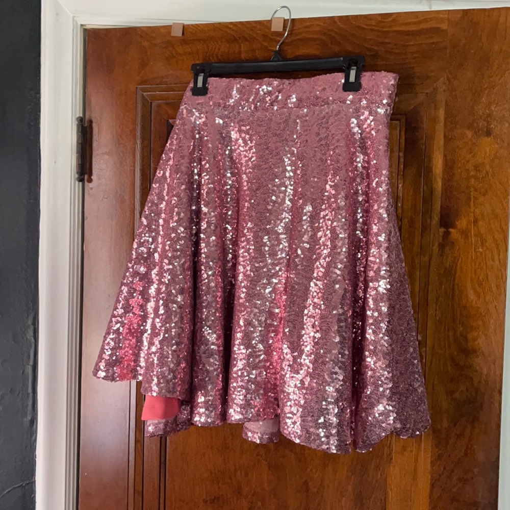 Zelie for She knee length pink sequins skirt.